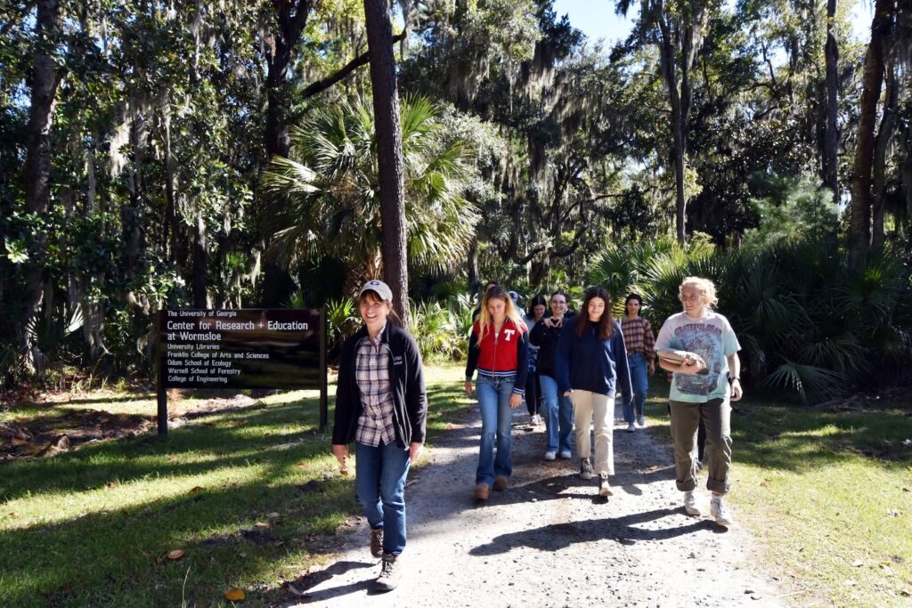 Mary Socci (left) gives Semester at Skidaway students a tour of the UGA Center for Research and Education at Wormsloe.